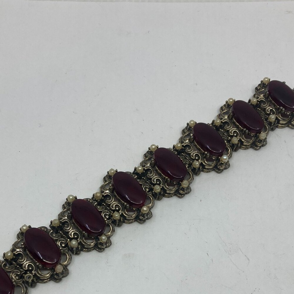 Vtg SELRO SELINI ? thermoplastic red metal gothic panel bracelet